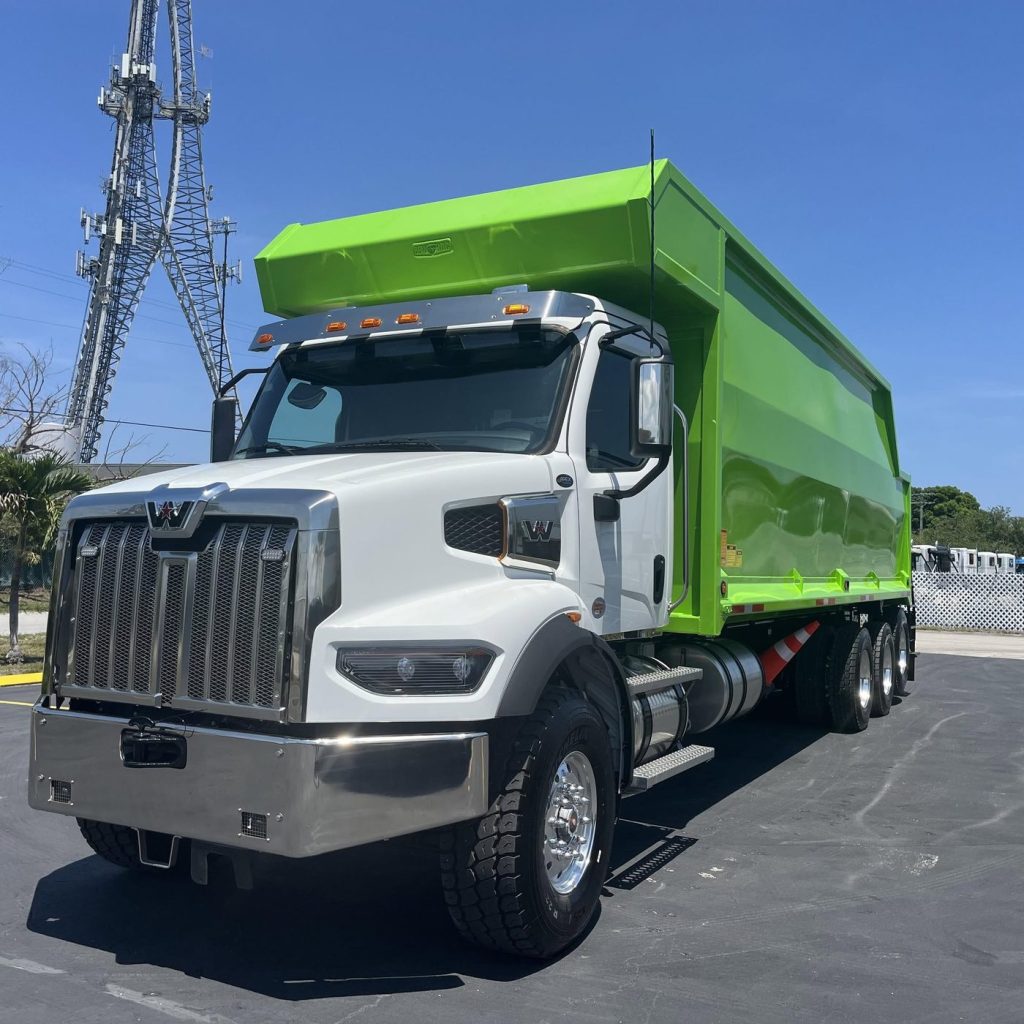 Yoder's Grapple Service grapple truck ready for a haul-off in Sarasota County